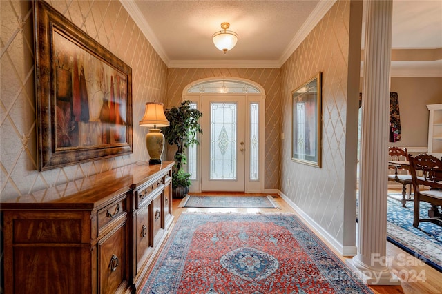 foyer entrance with ornamental molding