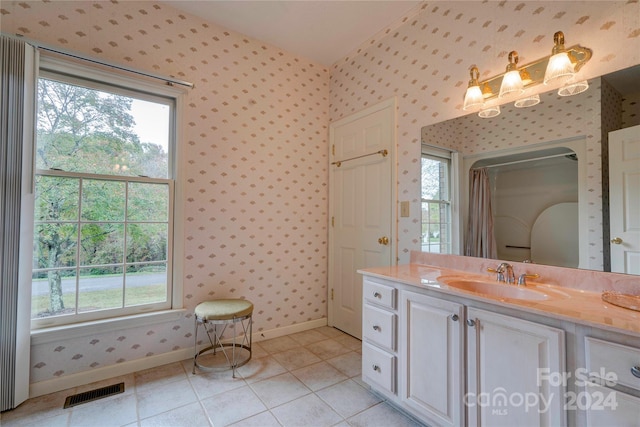 bathroom with vanity and tile patterned floors