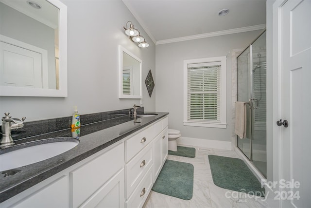 bathroom featuring toilet, vanity, an enclosed shower, and ornamental molding