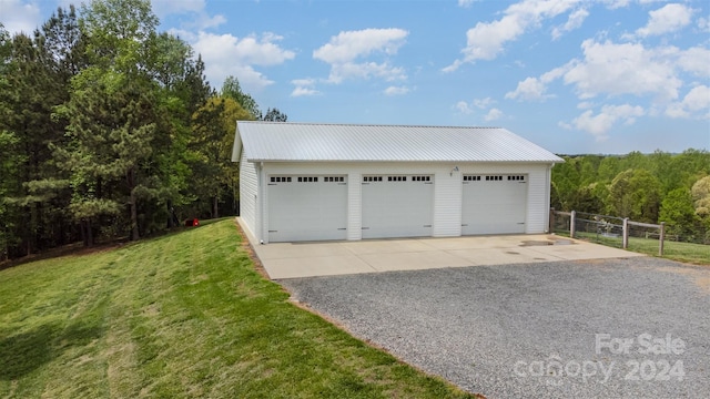 garage with a lawn