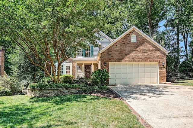 front facade with a garage and a front lawn