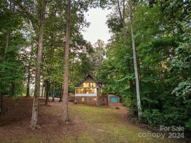 view of yard with a sunroom