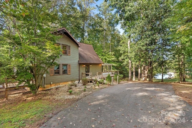 view of home's exterior with a deck