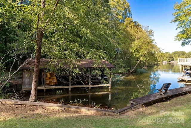 view of dock with a water view