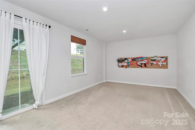 view of carpeted spare room