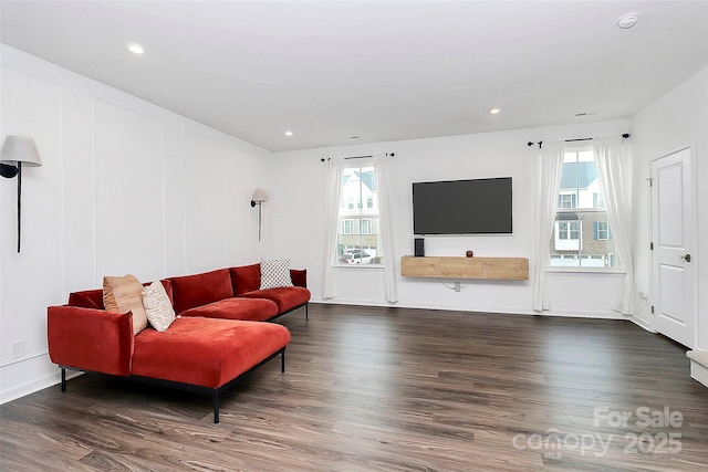 living room with dark hardwood / wood-style floors