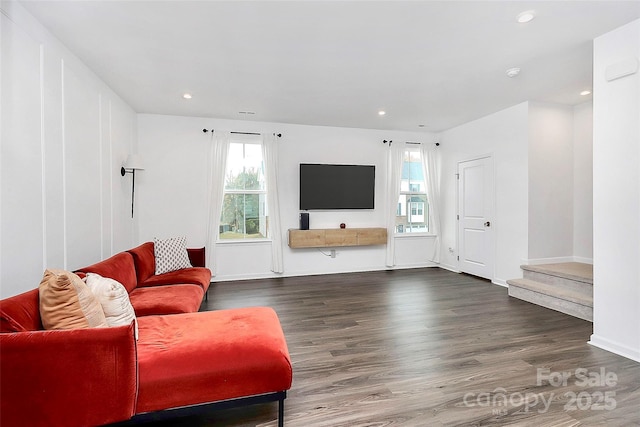 living room with dark wood-type flooring