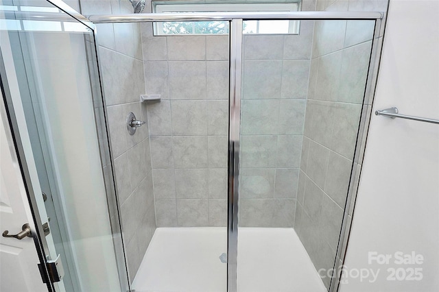 bathroom with an enclosed shower