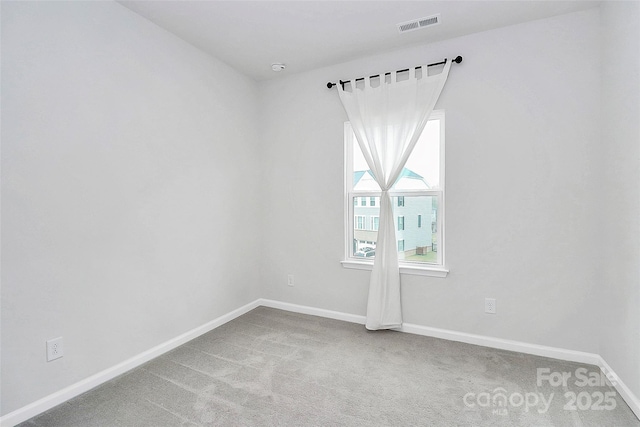 view of carpeted spare room