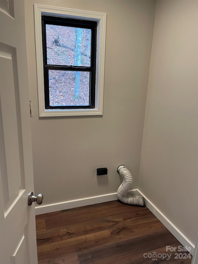 empty room featuring dark wood-type flooring