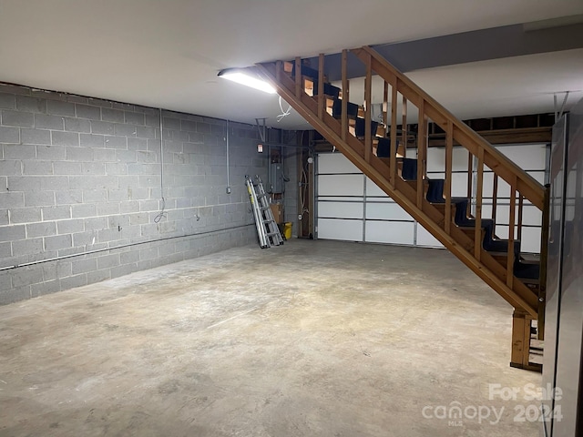 basement featuring electric panel