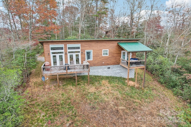 rear view of house with a deck