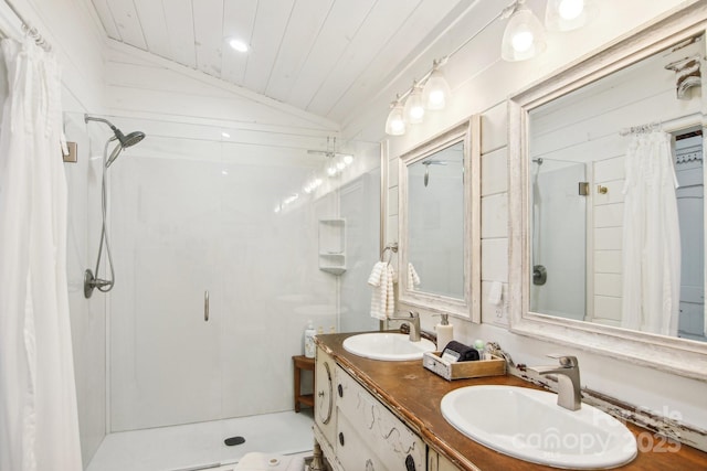 bathroom with vanity, lofted ceiling, wooden ceiling, and a shower with shower curtain