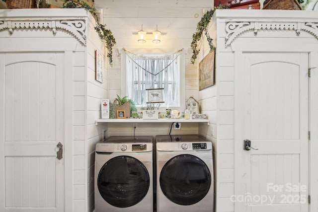 laundry room featuring separate washer and dryer