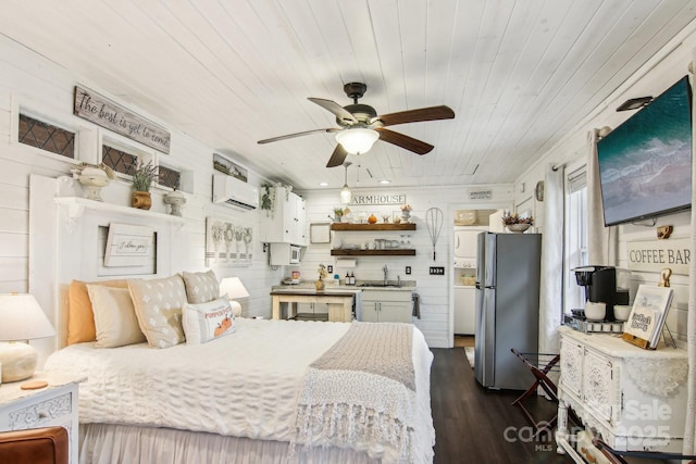 bedroom featuring dark hardwood / wood-style floors, stainless steel refrigerator, sink, a wall mounted AC, and wood ceiling