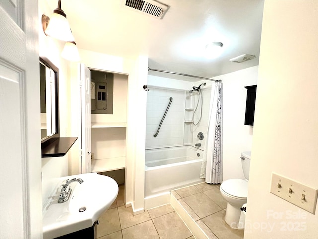 full bathroom with sink, tile patterned flooring, electric panel, toilet, and shower / tub combo with curtain