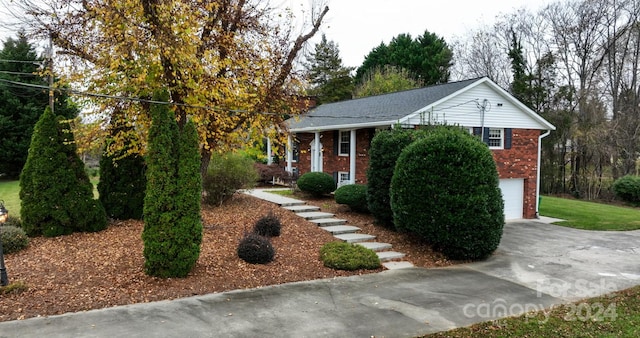 view of property exterior featuring a garage