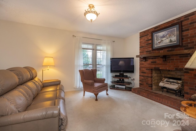 living room with a brick fireplace, a textured ceiling, and carpet flooring