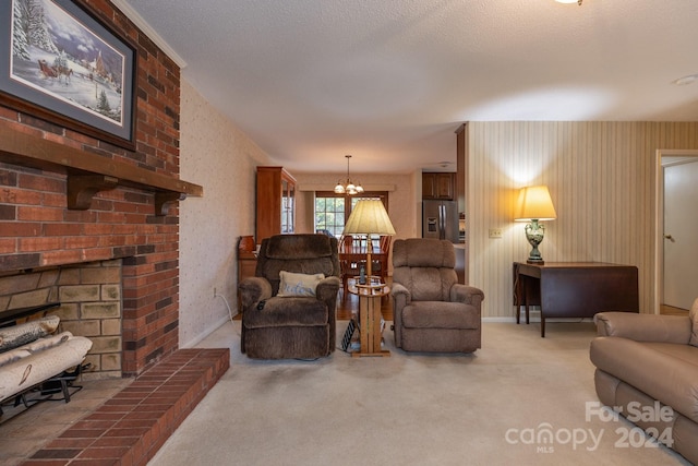 carpeted living room featuring a brick fireplace and a chandelier