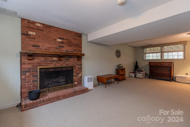 unfurnished living room with a brick fireplace, a textured ceiling, and carpet flooring