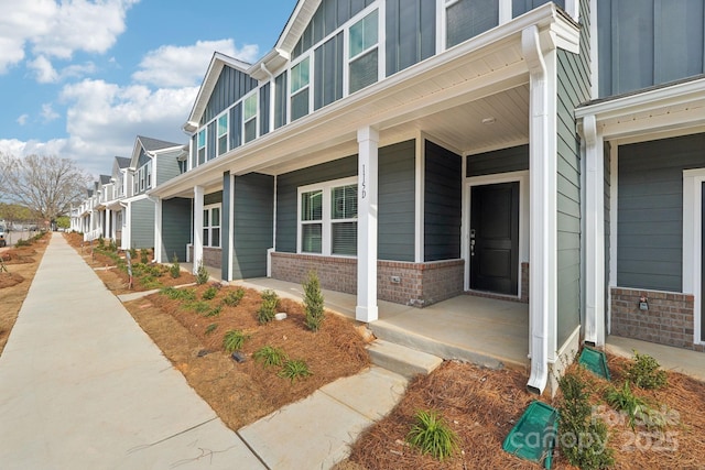 exterior space featuring covered porch