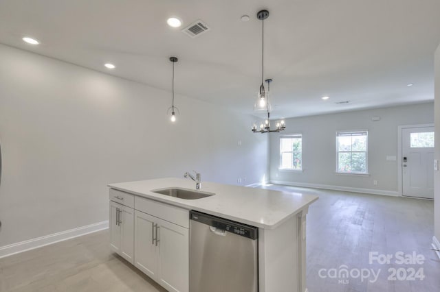 kitchen with dishwasher, sink, light hardwood / wood-style floors, a center island with sink, and white cabinets