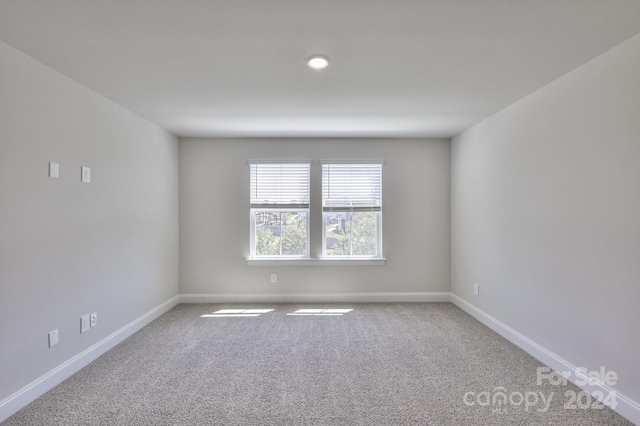 view of carpeted spare room