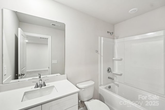 full bathroom with vanity,  shower combination, and toilet