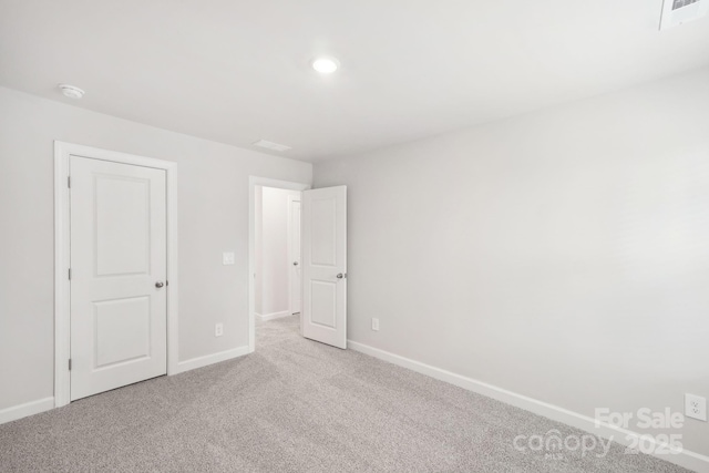 unfurnished bedroom featuring carpet floors