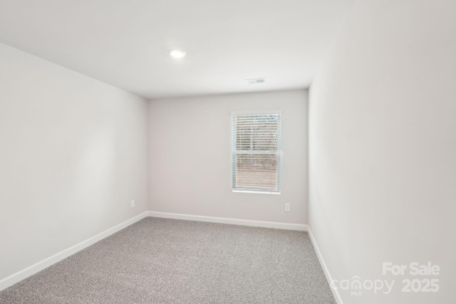 empty room with carpet floors