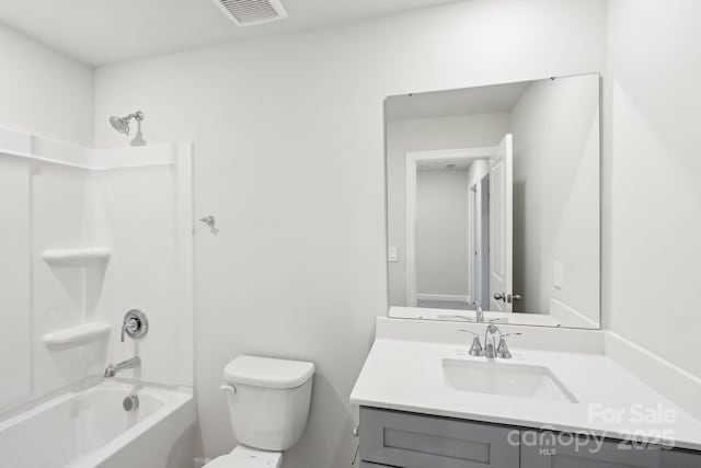 full bathroom featuring shower / bathtub combination, vanity, and toilet