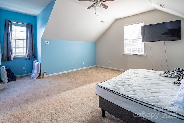 bedroom featuring ceiling fan, light colored carpet, and vaulted ceiling