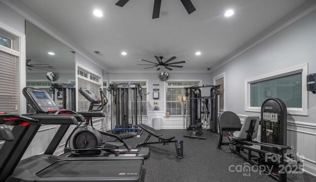 exercise room with ornamental molding