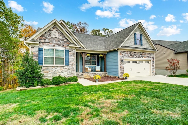 craftsman-style home with a garage and a front lawn