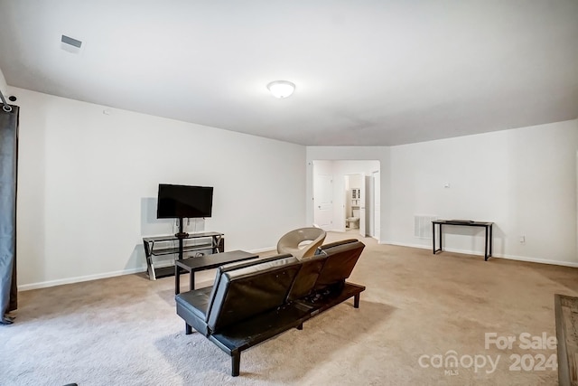 living room featuring light carpet