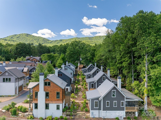 drone / aerial view featuring a mountain view