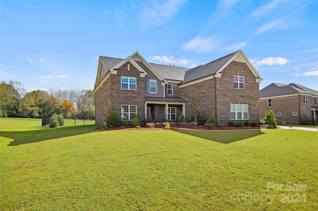 view of front of home featuring a front lawn