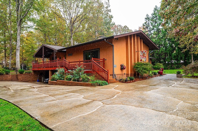 view of home's exterior featuring a deck