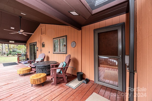 wooden terrace with ceiling fan