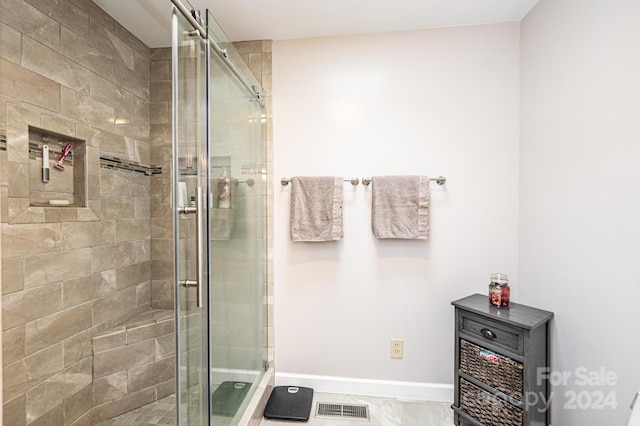 bathroom featuring walk in shower