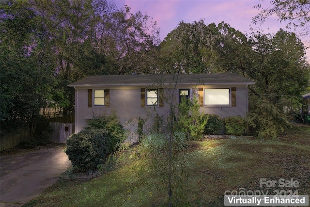 view of property exterior at dusk