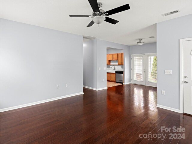 136 Lower Grassy Branch Rd, Asheville, NC 28805 - unfurnished living room with dark wood-style floors and ceiling fan