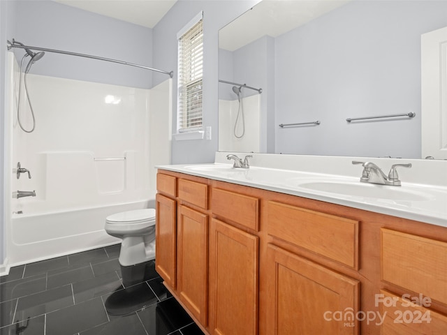 full bathroom featuring toilet, vanity, shower / bath combination, and tile patterned floors