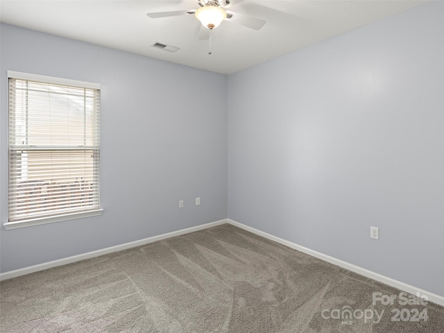 136 Lower Grassy Branch Rd, Asheville, NC 28805 - carpeted spare room featuring a ceiling fan and baseboards