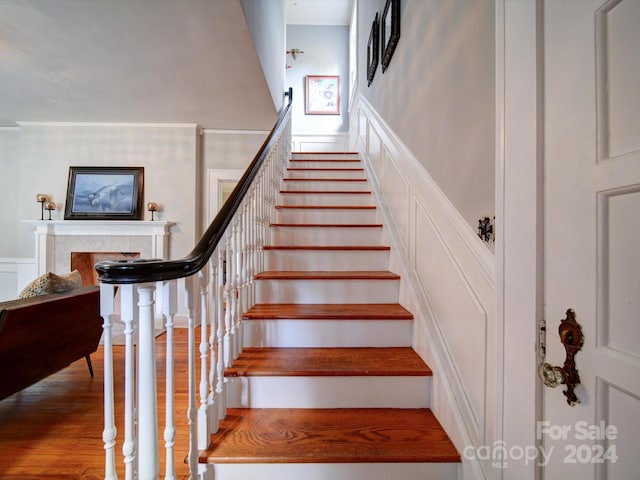 stairs with wood-type flooring