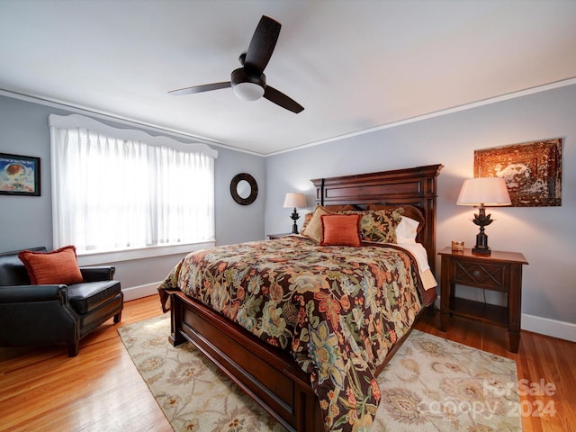 1116 E Franklin Blvd, Gastonia, NC 28054 - bedroom with ornamental molding, wood finished floors, and ceiling fan