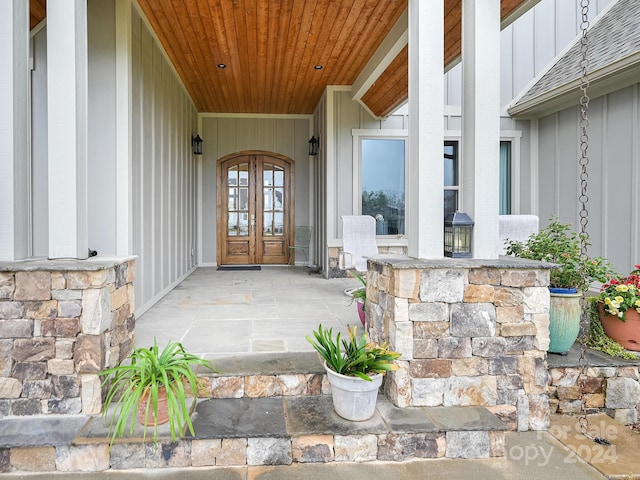 doorway to property featuring french doors