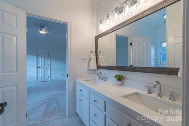 bathroom with vanity and ceiling fan