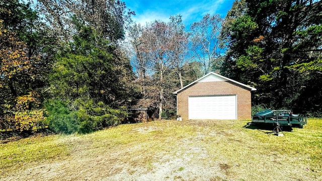 garage with a yard