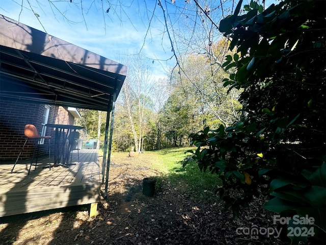 view of yard with a deck